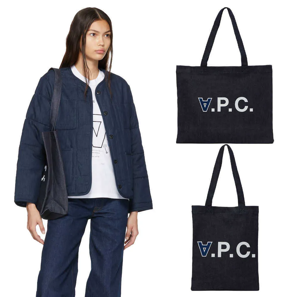 Trendy AP Ny produkt denim broderad handhållen en axel canvas väska trendiga väska mäns och kvinnors shoppingväska 240419