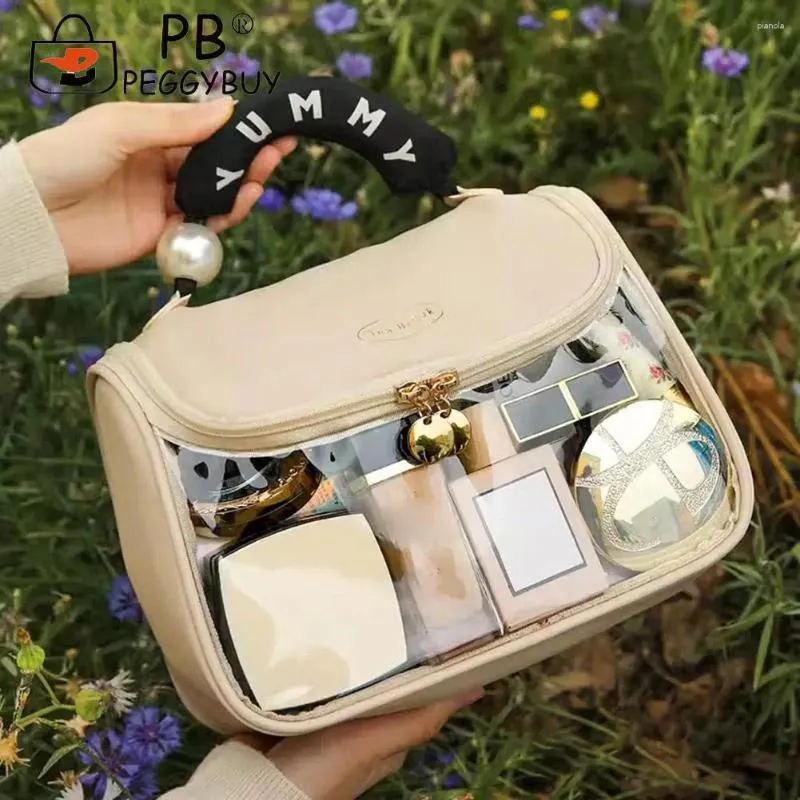 Bolsas cosméticas Bolso de viaje portátil Organizador de maquillaje impermeable con cremallera lavable con mango de gran capacidad para niñas que viajan