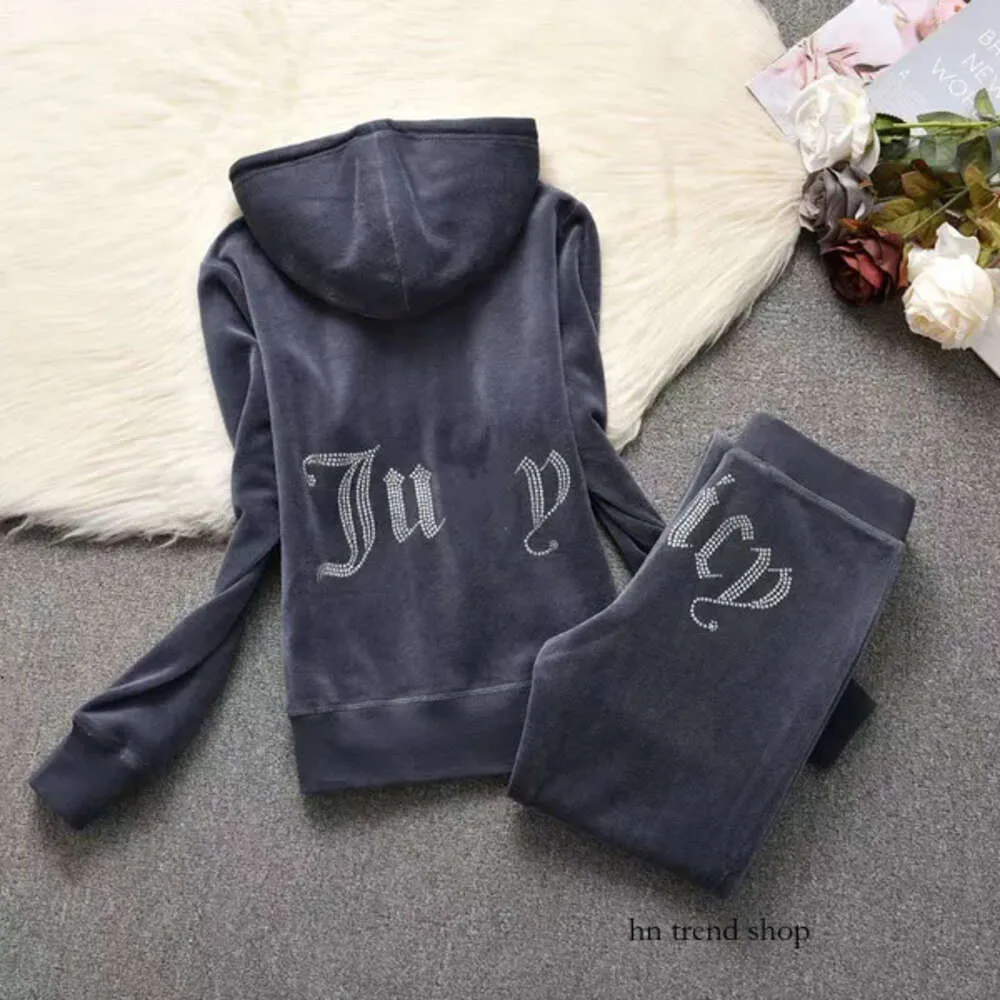 2024 Kvinnors tvådelade byxor Veet Juicy Tracksuit Women Coutoure Set Track Suit Couture Juciy Coture Sweatsuits Letters Hooded Hoodie Loose 406