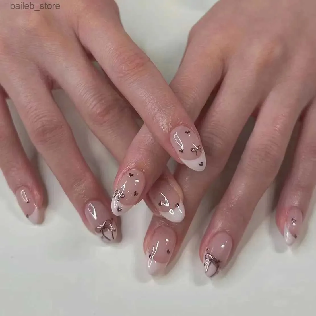 Uñas falsas 24 piezas de clavos falsos dulces coreanos parche de estilo rosa francés con diseño de arco para niñas portátiles Press en consejos de manicura de uñas Y240419