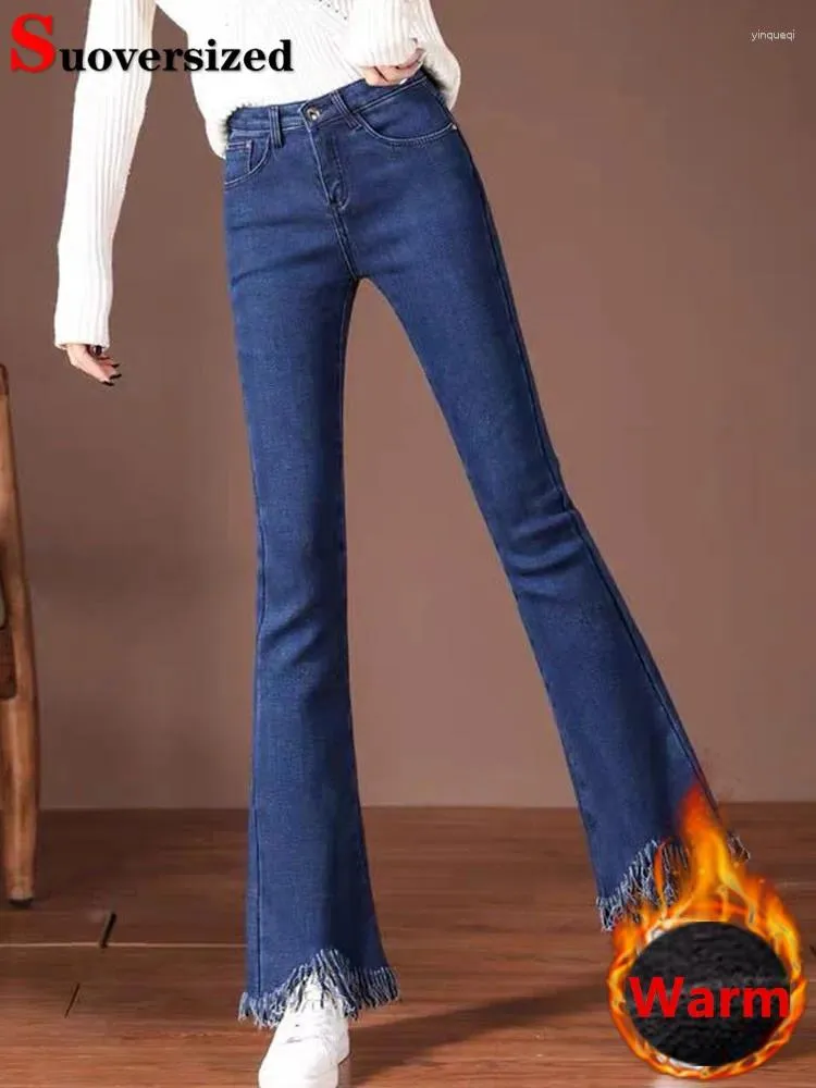 Jeans de mujer gruesos Velvet de terciopelo forrado Pantalones de bengala Invierno Diseño de borla de invierno Vaqueros cálidos Trouseers Mid Wistist Plush Big Size Denim Broek