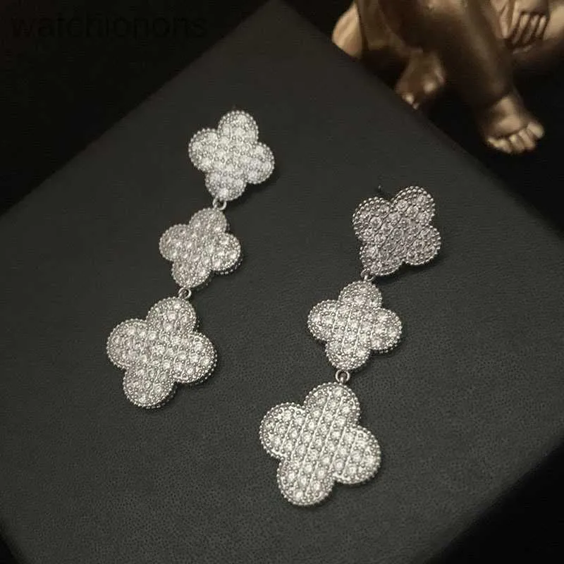 Boucles d'oreilles de créateur originales de haut niveau de qualité supérieure avec micro zircon quatre fleurs de pétale super immortelles bijoux élégants avec logo