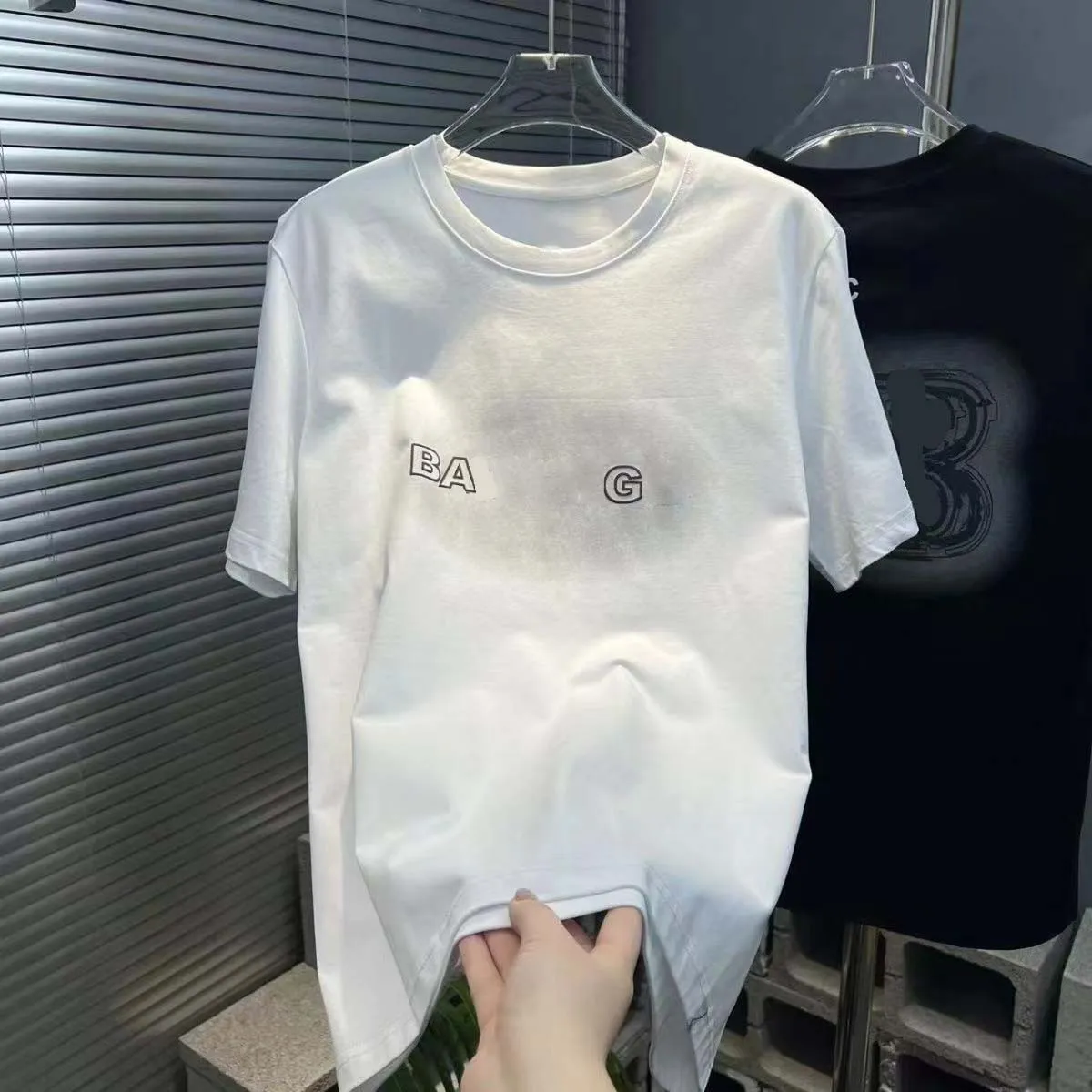 T-shirt de moda de designer de paris famosa feminina feminina casual feminina de camiseta de camiseta de rua com estampa de rua mais vendida