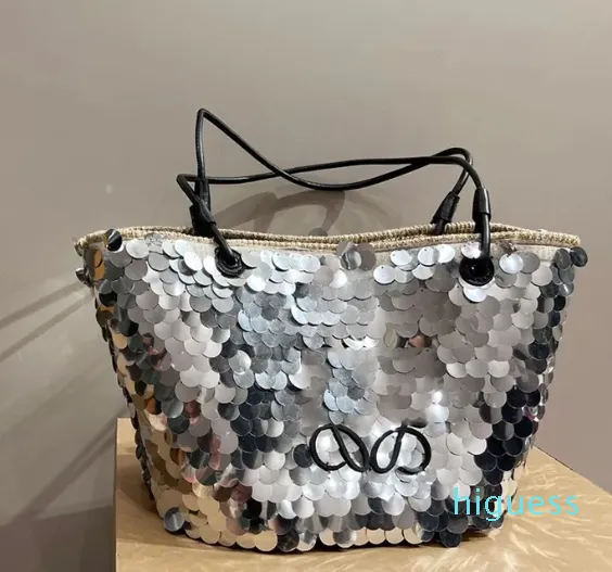 2024 Bolsas de lantejoulas de lantejoulas Bolsas de ombro de praia de palha de verão bolsas de cesto de cesto de cestas designer feminino tece bolsa de mão de grande capacidade Bolsa