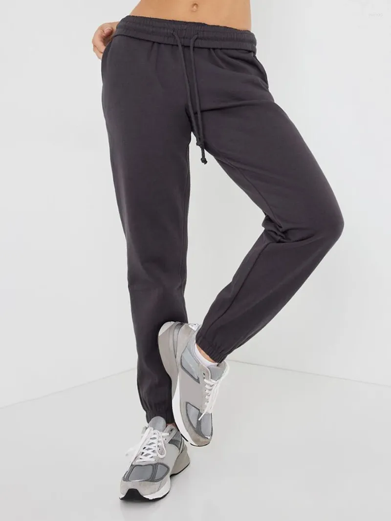 Pantaloni da donna Donne donne elastiche pantaloni della tuta a colori solidi correre con tasche pantaloni atletici casuali per lo sport