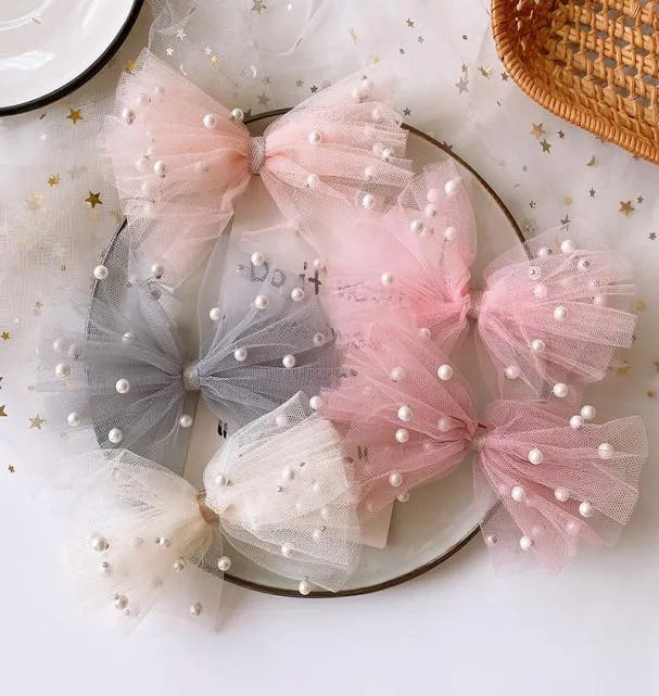 2020 NOUVELLE FILLE SWEET CORÉENNE Belle imitation colorée Perle Yarn Bow Clip de canard