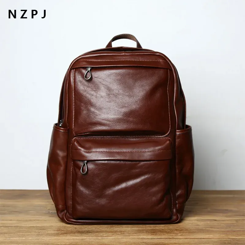 Backpacks NZPJ Leather Men's Backpack Men's Backpack European and American Fashion Travel Bag vintage tête première couche