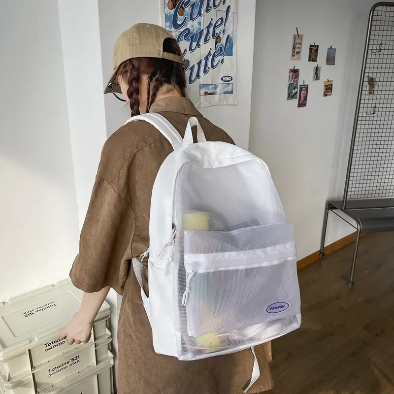 Sacs 2023 Nouveau dans un sac à dos transparent Sacs d'école de filles Femmes Femmes Sac à dos Clear Imperproofr