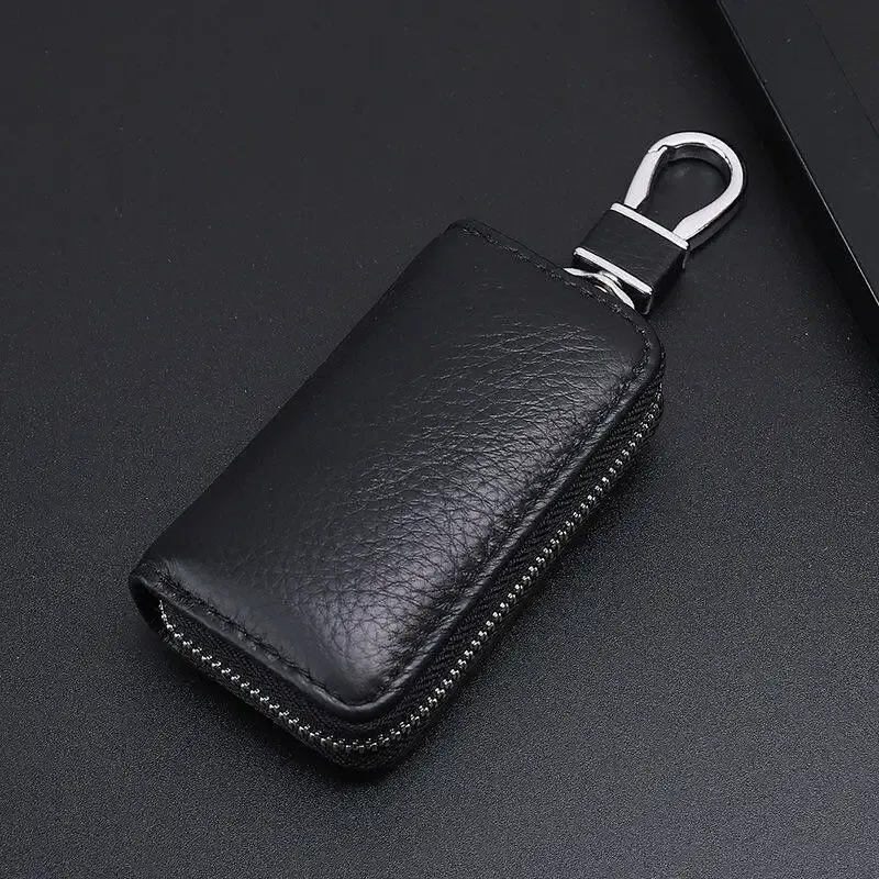 Carteiras Novo Chave de couro genuíno de alta qualidade Bolsa de chave unissex de carro Slim Carra Smart Housekeeper Mini Small Keys Case Bolsa Cartel