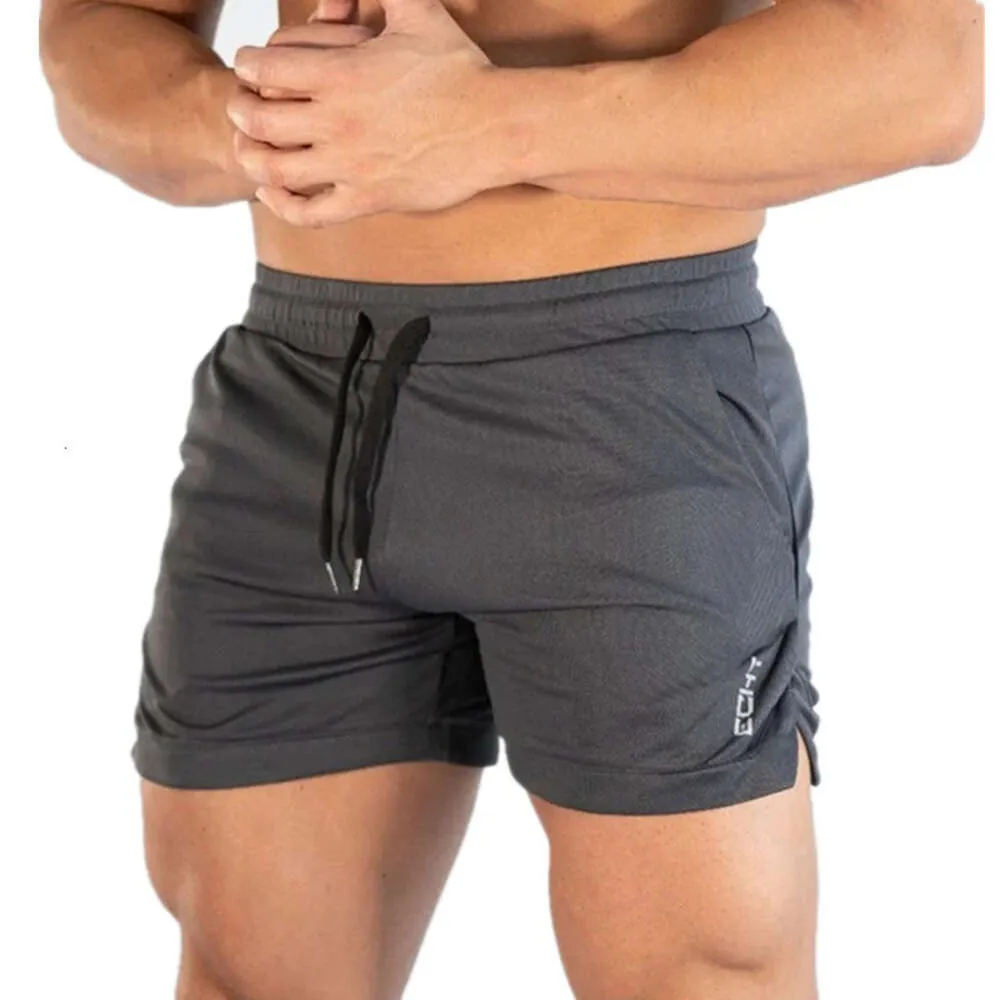 MAN shorts 2023 New Fiess Sports Man Summer Gyms Summer Workout Male Brewable Mesh Shorts décontractés Pant