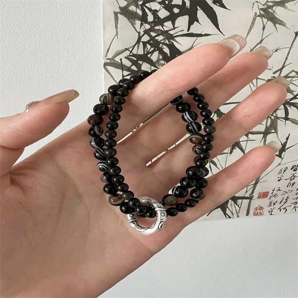 Geomancy-tillbehör som en fisk i vattendesign, avancerad KOI-säkerhetspänne, dubbel slingtemperament, obsidian agatarmband, kvinnlig armbandstrend