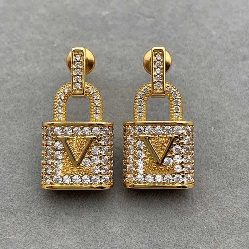Designer de moda Gold Lock Diamond Brincos para mulheres Senhoras personalizadas de alta qualidade Aço inoxidável Brincos de joias de joias