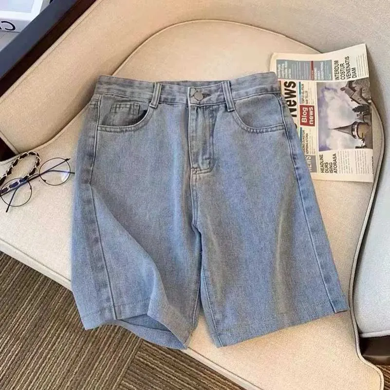 Kadın şortları yeni vintage kn uzunlukta eklenmiş tasarım moda gevşek eğlence tarzı strtwear yüksek strt serin tns kadın kot şort katı y240420