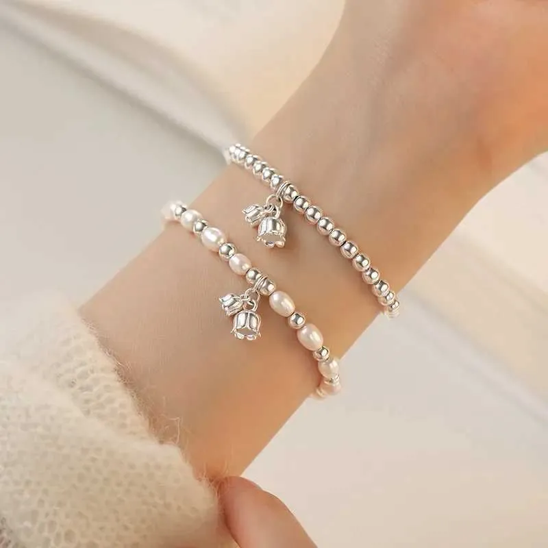 Chain Lily of the Valley Pearl Bracelet Double couche Bracelet Perle pour femmes conception de conception Bracelet de charme de bijoux coréen Y240420