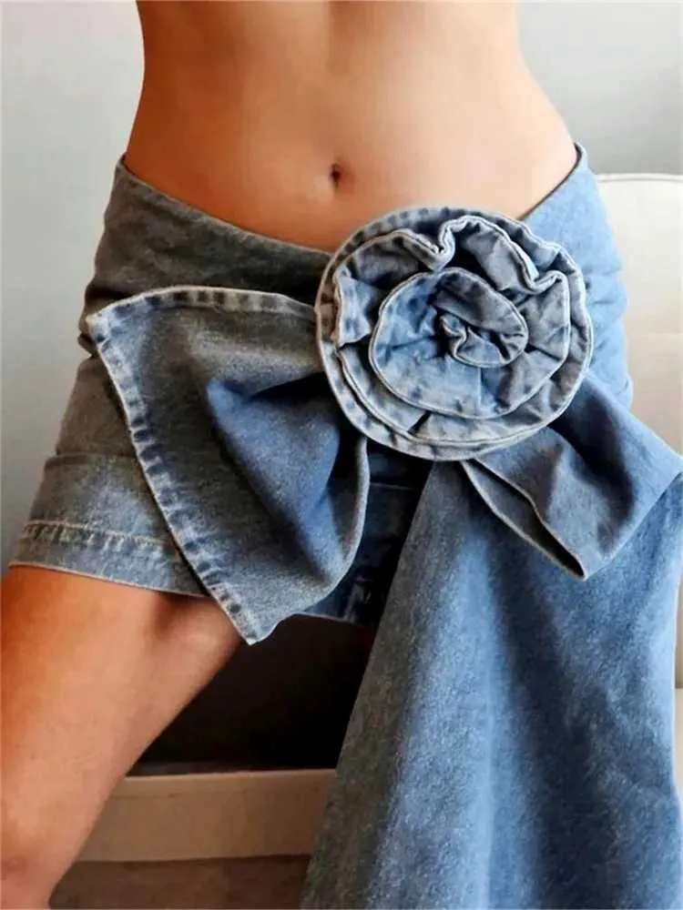 Saias mulheres jeans de saias curtas com grande flor 3d flor 2023 moda retro chique na cintura alta mini saias y2k estético sexy lápis saia de quadril y240420