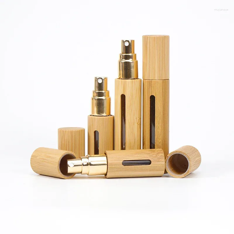 Bouteilles de rangement 50pcs 5 ml / 10 ml de bambou pulvérisation bouteille de bouteille essentielle huile essentielle en bois mini-récipient cosmétique rechargeable portable