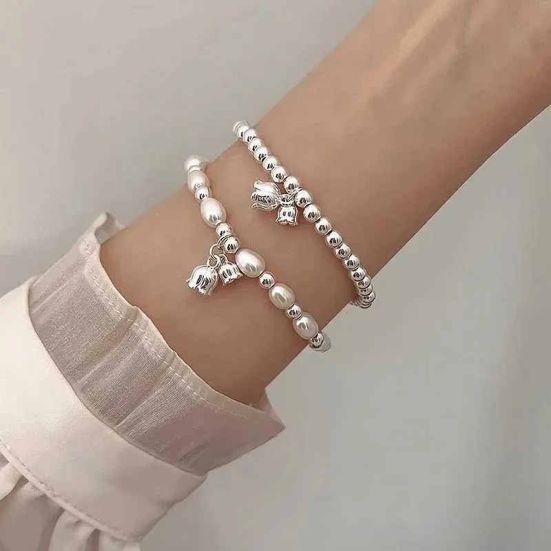 Chain Lily of the Valley Pearl Bracelet Double couche Bracelet Perle pour femmes conception de conception Bracelet de charme de bijoux coréen Y240420