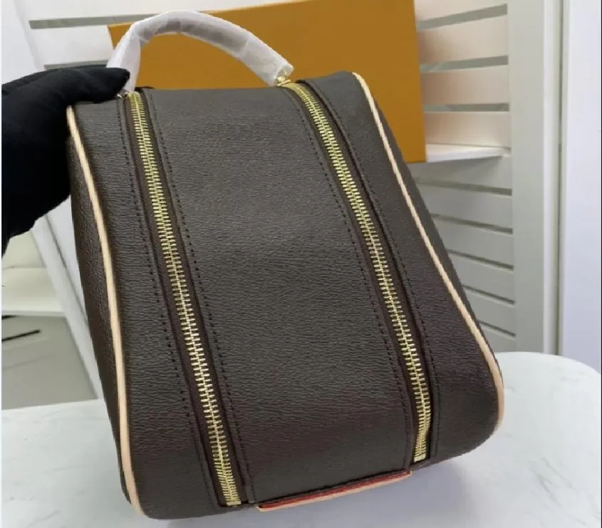 28x16x13cm Bolsa de produtos higiênicos de couro genuíno Men lava as bolsas de luxo designers compõem bolsas de vaso sanitário cosmético Caice de maquiagem de maquiagem ZIP6784543