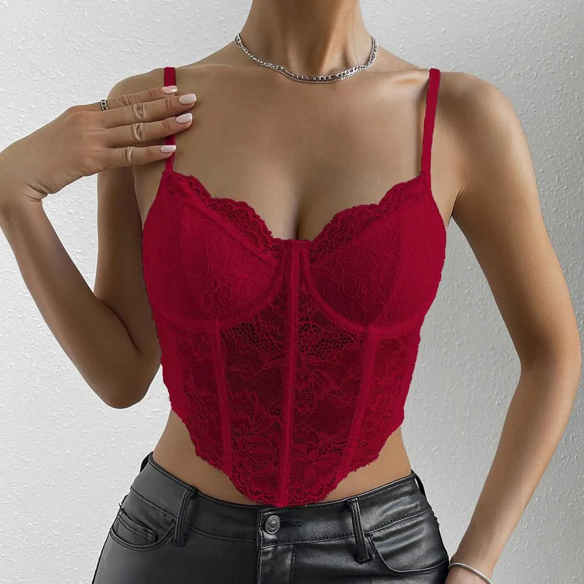 Tanks pour femmes Camis Vemina sexy vneck broderie en dentelle Hollow Out Spaghetti Slim Crop Topshr Halter Backless Camisole Vest Fishbone Corset Y240420