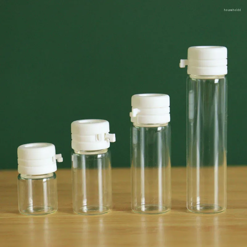 収納ボトル100pcs 1/2/3/5mlエッセンシャルオイル空の透明ガラス化粧用ジャーコンテナホワイトキャップ香水エッセンスサンプルボトル