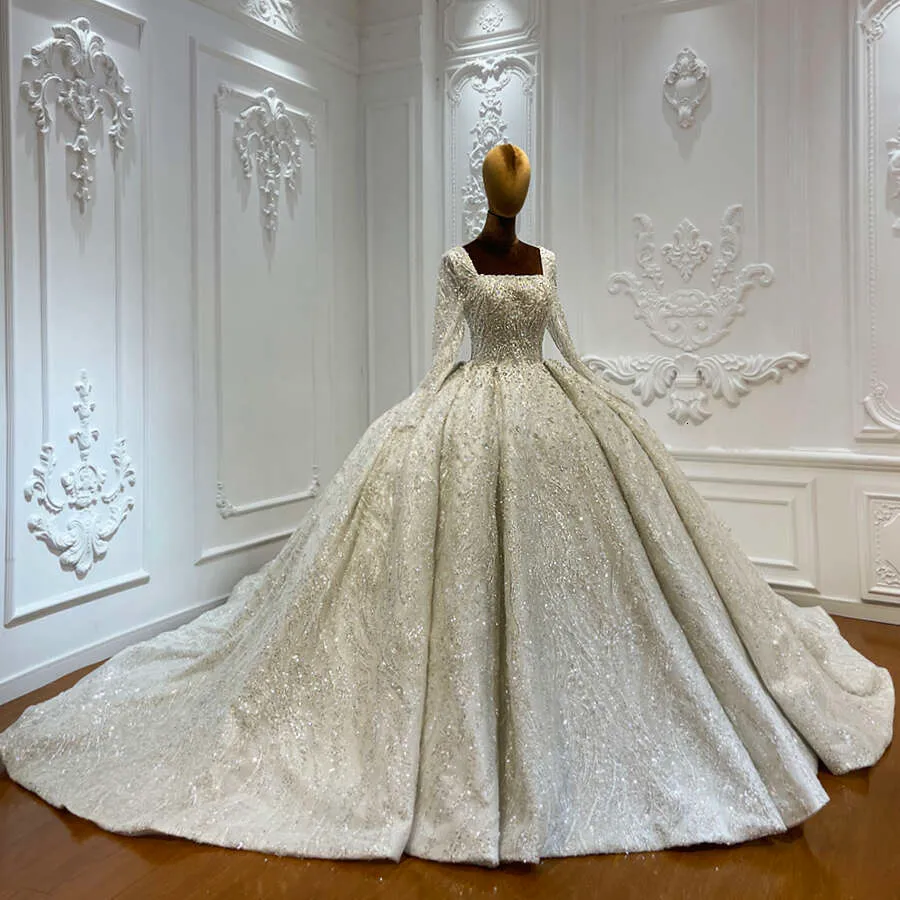 heavily beaded wedding dress Heavy Beaded Pearl Wedding Dress Off-White Ball Gown Long Sleeves – Elsi  John main image 1