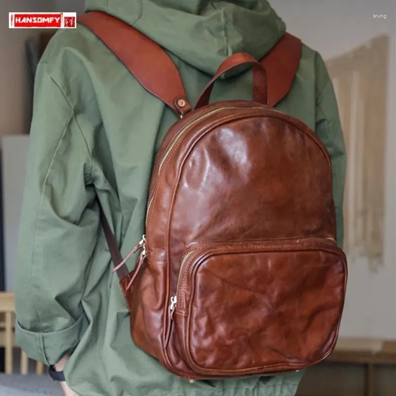 Backpack Retro Leather Men's Primeira camada de cheiro de gado de grande capacidade Trendência da moda Moda Mochilas bolsas escolares