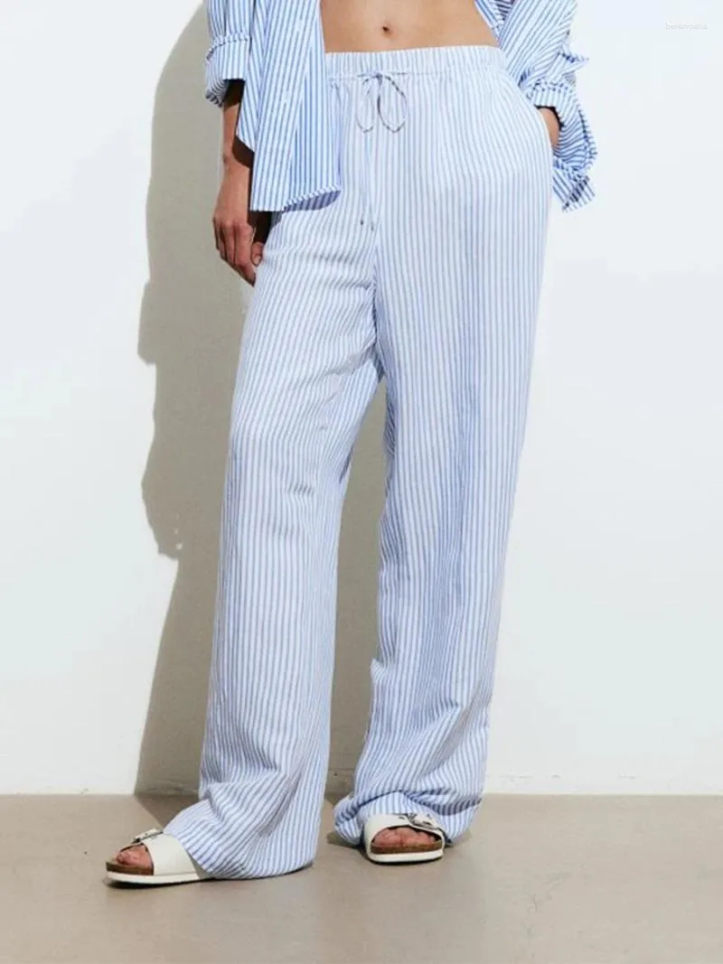 Spodnie damskie kobiety luźne szerokie legalne spusty do druku w paski elastyczne sznurki z kieszeniami do pracy w biurze streetwearii