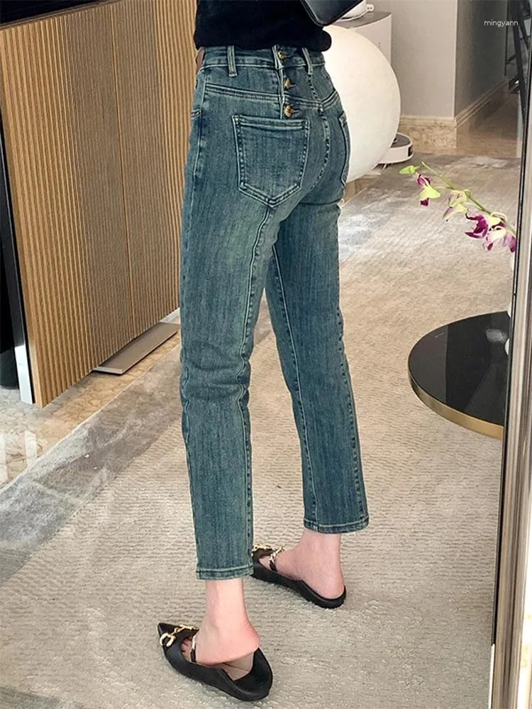 Kvinnors jeans y2k guangdong office lady hela säsongen manschetter knappfickor kläder och erbjuder äkta