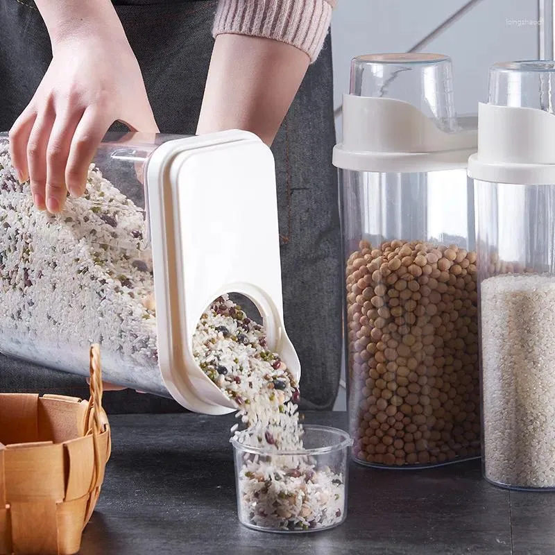 Bouteilles de rangement 2pcs 2,5 L en plastique Grain Céréal Cornflakes Dispensateur avec tasse de garde-manger à séchage Polonteur de garde-manger Organisateur de cuisine Farine