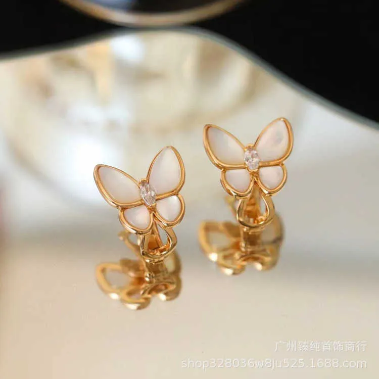 Designer charm High version Van butterfly earrings for women with high-end feel white fritillaria bow tie full of diamond horse eyes shell