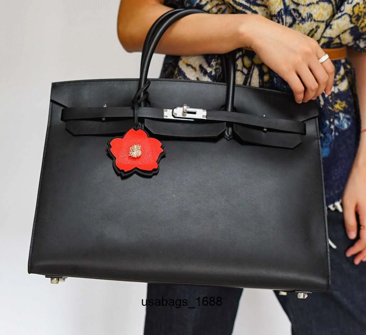 Diseñadores de hombre monedero de 500 cm Totas totalmente hechas a mano Candering Men Luxury Purse Bolsa de cuero genuino Precio al por mayor