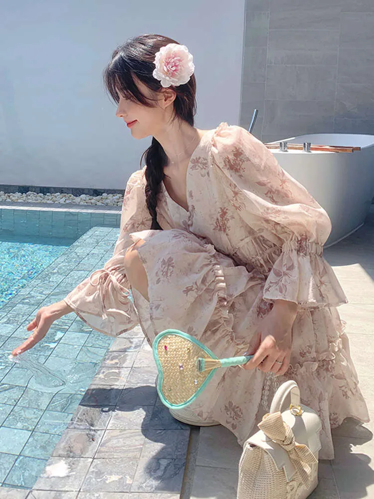 Łama herbaty w stylu francuskim talia kwiecista sukienka dla kobiet 2024 wiosna i jesień Nowy mała postać zakrywające brzuch odchudzanie pierwsza miłość wróżka
