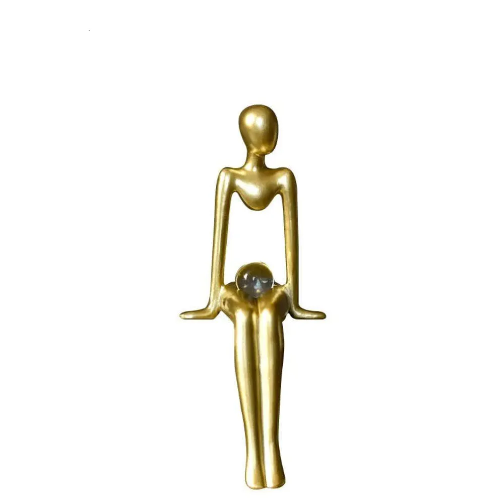装飾的なフィギュア樹脂抽象物体彫像装飾品キャラクターアート座っている姿勢彫刻が飾る黄金のモダンな生活装飾