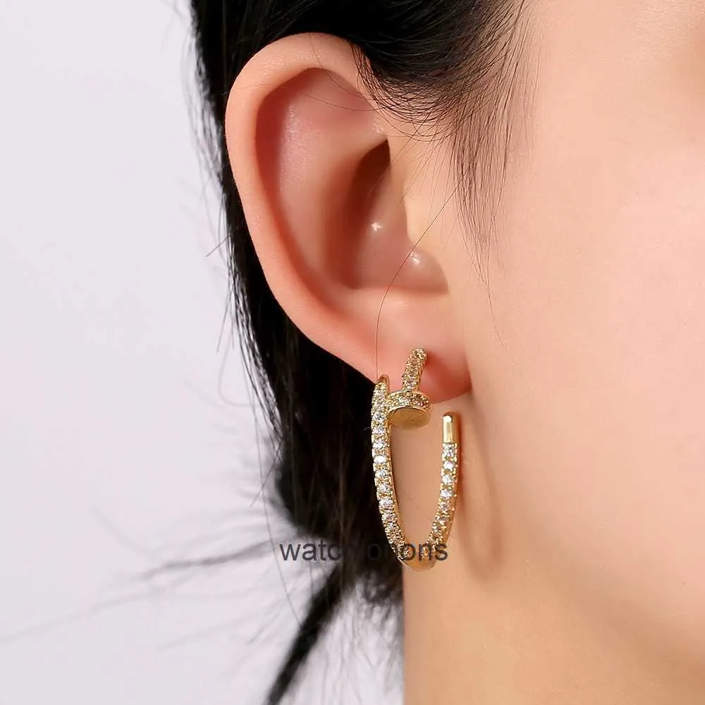 High-end Luxury carrtier Earring Xinshi diamond inlaid circular hollow earrings large and simple imitation nail