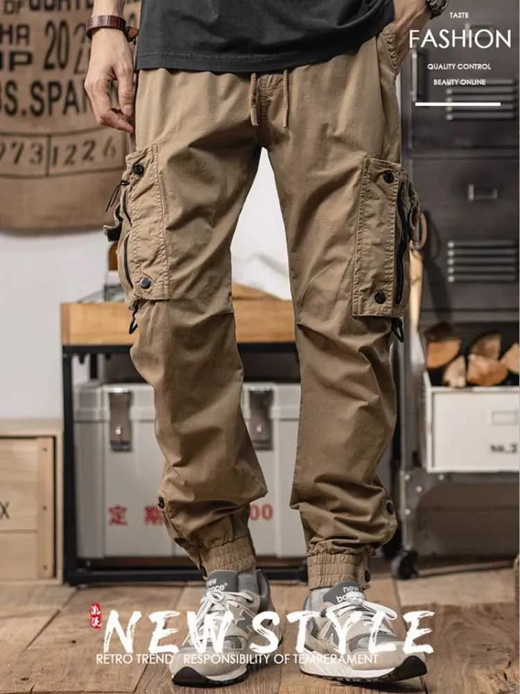 Spodnie męskie w stylu amerykańskim spodnie do odzieży roboczej dla mężczyzn Nowe multi kieszeni swobodne osoby dojeżdżające do pracy na świeżym powietrzu, funkcjonalne legginsy taktyczne Y240422