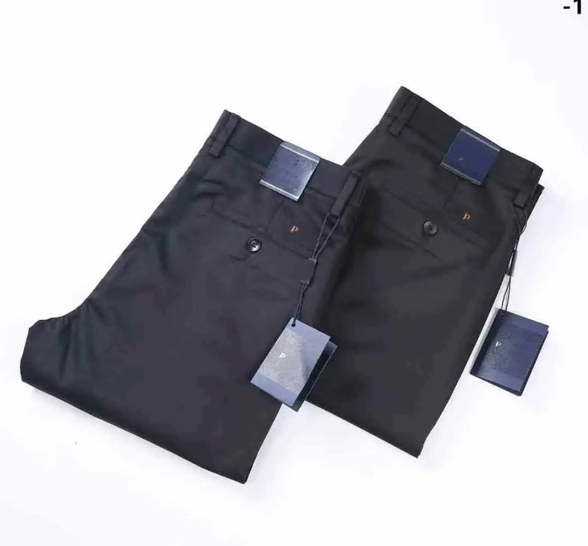 Paa Designer luksusowe spodnie męskie spodnie biznesowe spodnie biznesowe swobodne spodnie mody marka solidne kolory legginsy czarny niebieski 2 kolor elastyczne talia hurtowa