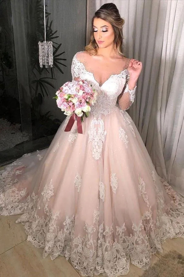 Blush Pink A-Line Long sleeve wedding dresses with Sheer Neckline, Long Sleeves, Appliques, Buttons, Back Beads, and Sequins - Perfect for Engagement Blush Pink A-Line Long sleeve wedding dresses with Sheer Neckline, Long Sleeves, Appliques, Buttons, Back Beads, and Sequins - Perfect for Engagement
