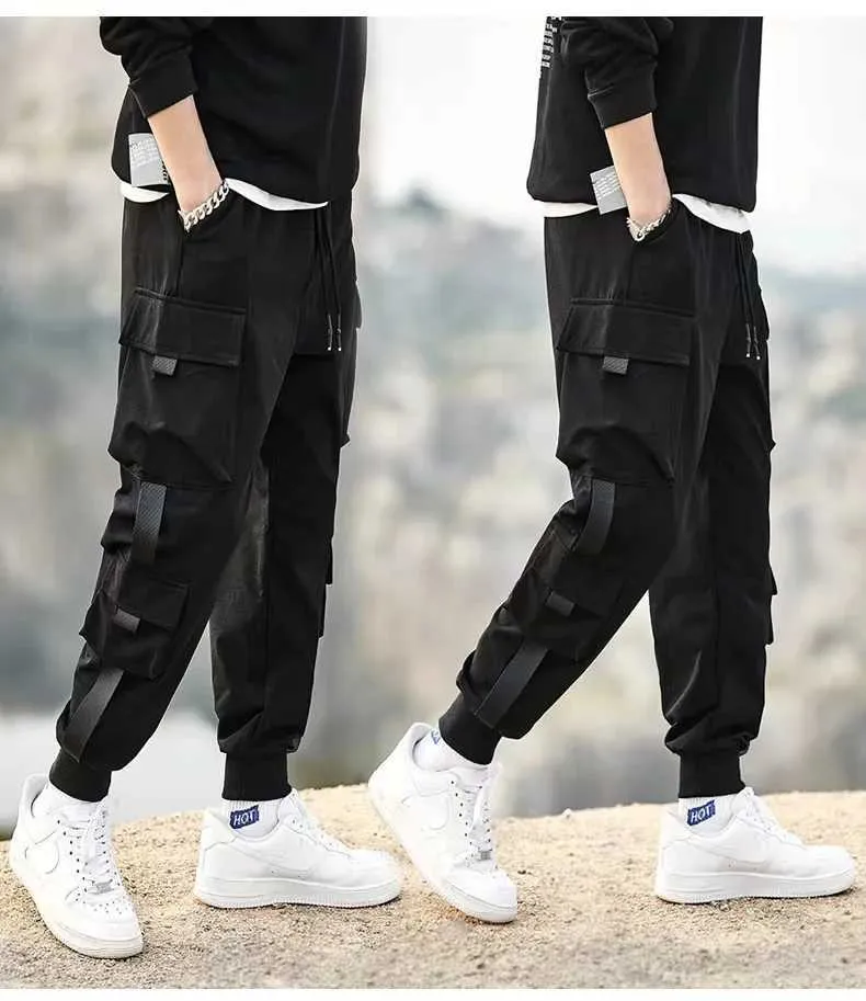 Мужские брюки модный комбинезон лодыжки с несколькими карманами, промытыми водой и универсальными повседневными штанами для тяжелого веса Y240422ABDB