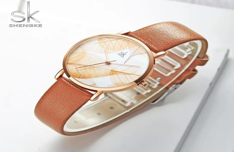 Shengke New Women Watches Creative Leaves Dial Bright Leather Strap Quartz Clock Fashion Carul Listwatch Montre Femme 214940913