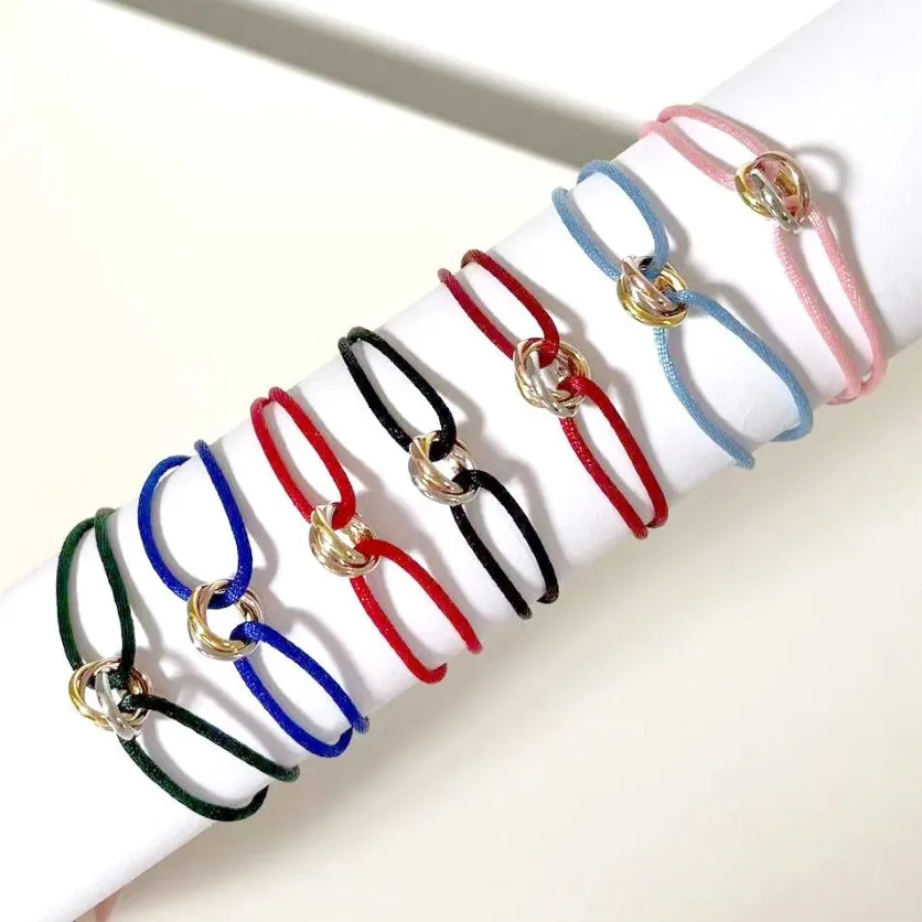 Gioielli designer Tre cerchi Braccialetti fascino coppia Bracciale in acciaio inossidabile corda a mano triciclica nera rosa rosso blu molti colori315p