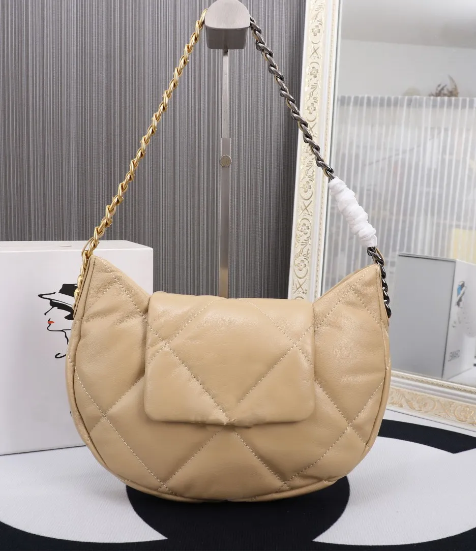 Famous Brand Tote Bag Boy Designer Sac réel en cuir en cuir en peau d'orde en peau d'or Sac Messager Sac Hobo Crossbody Fap Women Pourse Sac Sac Sac de portefeuille x140 BEIGE