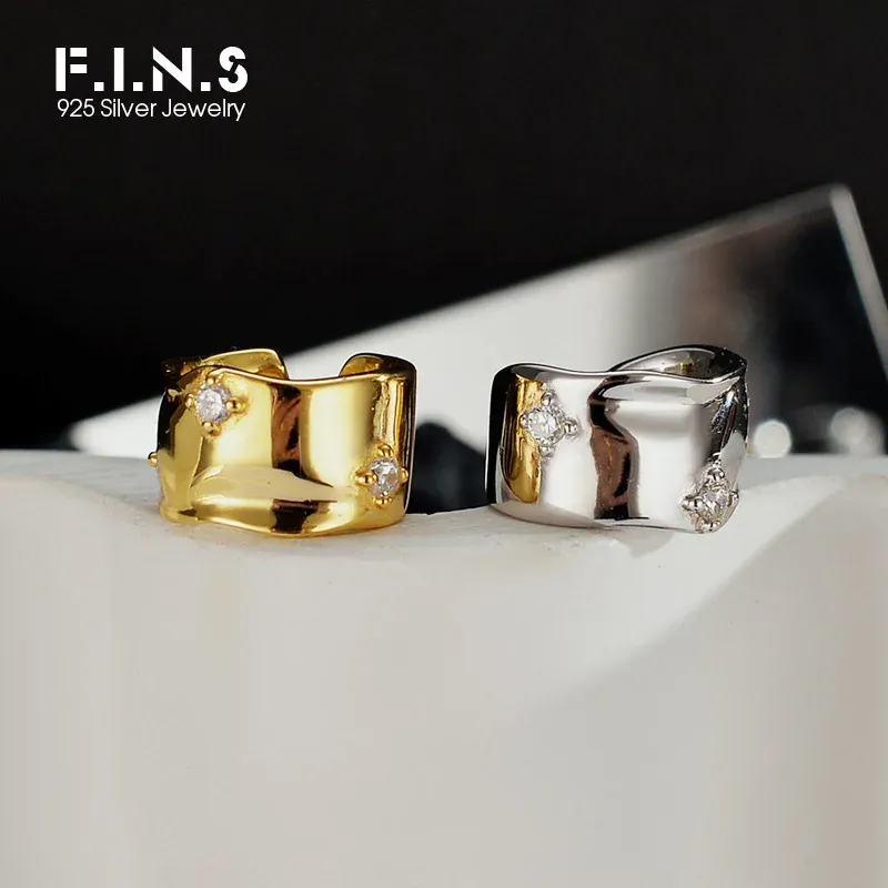 Boucles d'oreilles f.i.n.