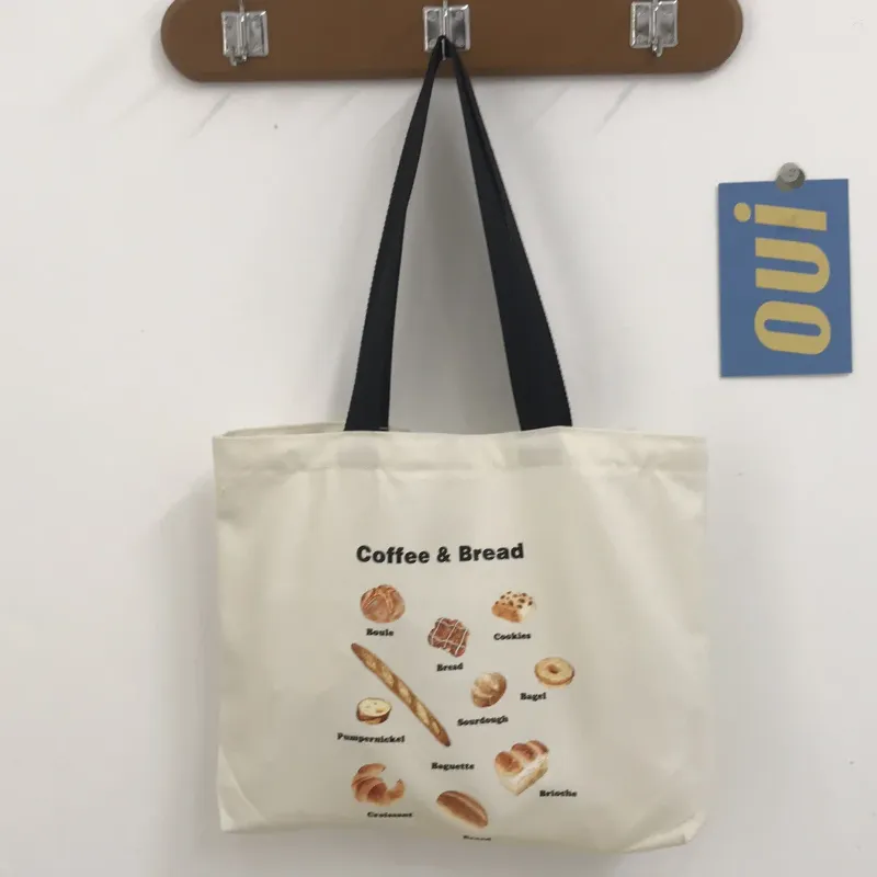 Shoppingväskor axel för kvinnor kvinnlig stor kapacitet casual handväska återanvändbar väska söt brödtryck dukduk