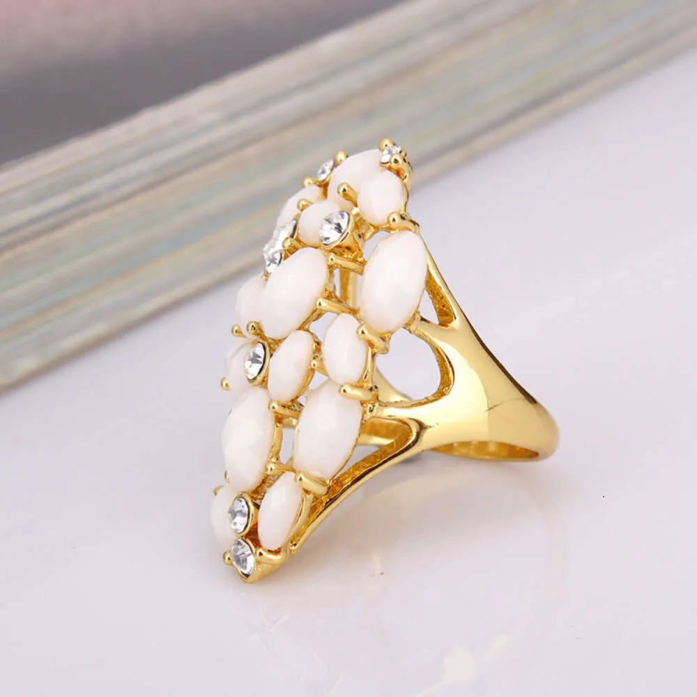 Golden Korean Version Droplet Shaped Fashionable Small and Fresh Pink Ring with An Eight Season Accessory