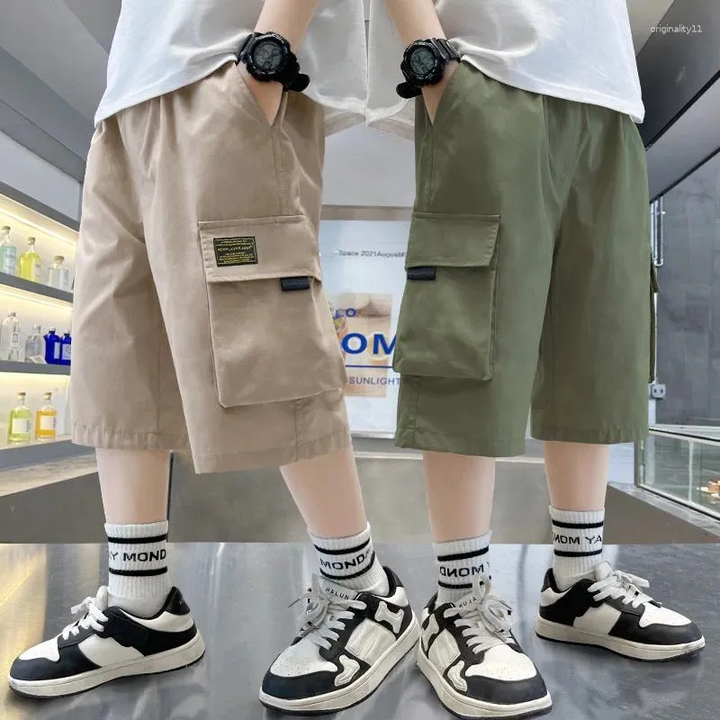 Calça 2024 Summer Boys Shorts Casual Loose Solid Color com bolso para crianças grandes 4-14 anos Crianças calças esportivas de algodão