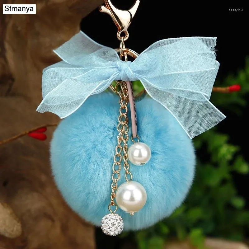 Chave -chave de teclados Originalidade Bowknot Angel Keychain Fur Pompom Ball Ball Holder Saco de Moda Jóias para Presente K1638