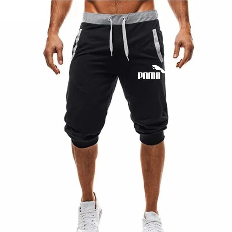 Utländsk handelstrend Men Sports Fifth Pants Drawstring Men Loose Stängande modesportbyxor korta