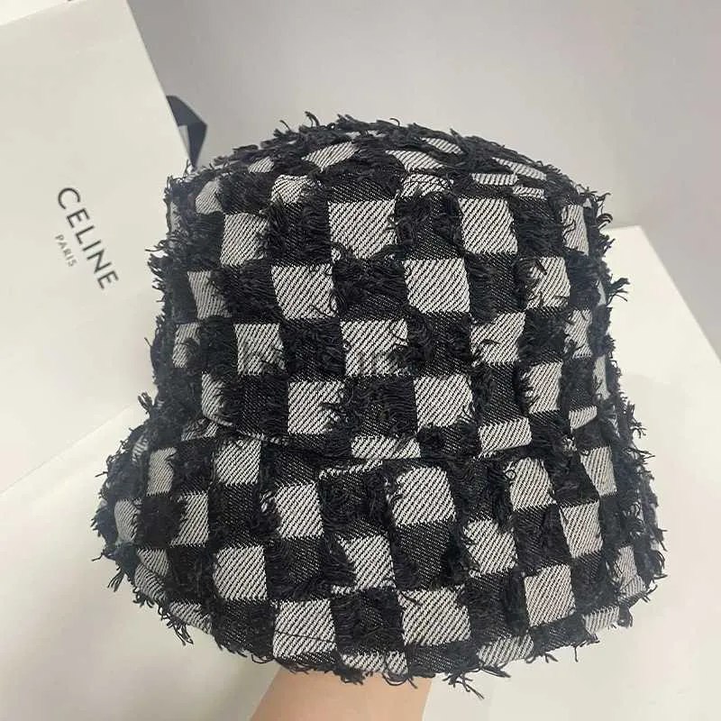 Designer szerokie czapki BRIM HATS HATS NISHE Design Chessboard Checkerboard Fisherman Hat dla mężczyzn Kobiety Mały kapelusz wiadra i zwykły trend twarzy czapek czapek dorzecza