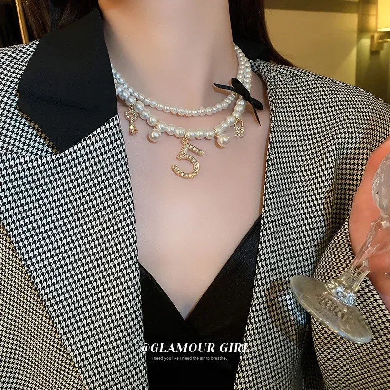 Collares Cristal No.5 Boquero Pearl Multicapa Collar Collar Collar llave Tonada de cadena de cuello