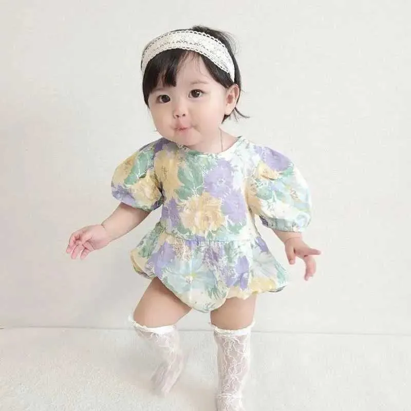 Rompers Fashion Flower Print Baby Girl Korte mouw Bodysuit katoenen prinses Kleding 2023 Zomer nieuwe baby jumpsuitkleding H240423